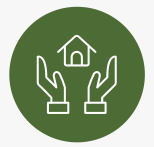 Green circle with white outline of house being held up by outline of white hands inside