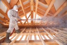 contractor blowing insulation