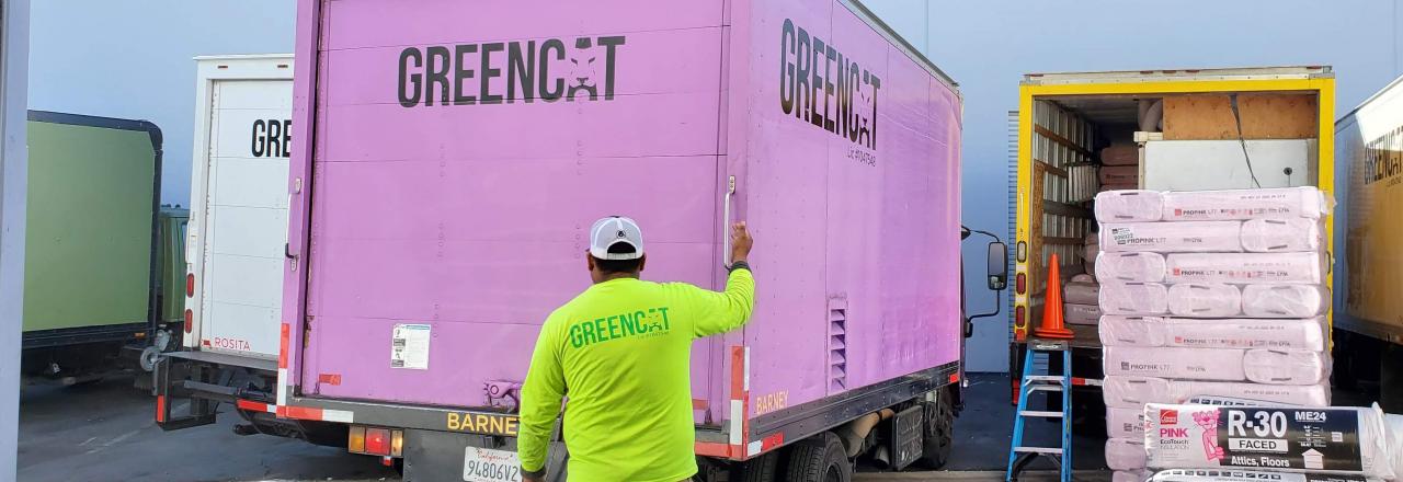 Greencat Employee Unloading Truck-Full of R-30 Insulation