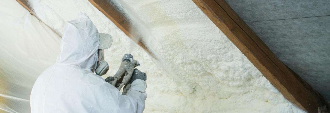 Spray Foam Insulation Being Applied To Attic